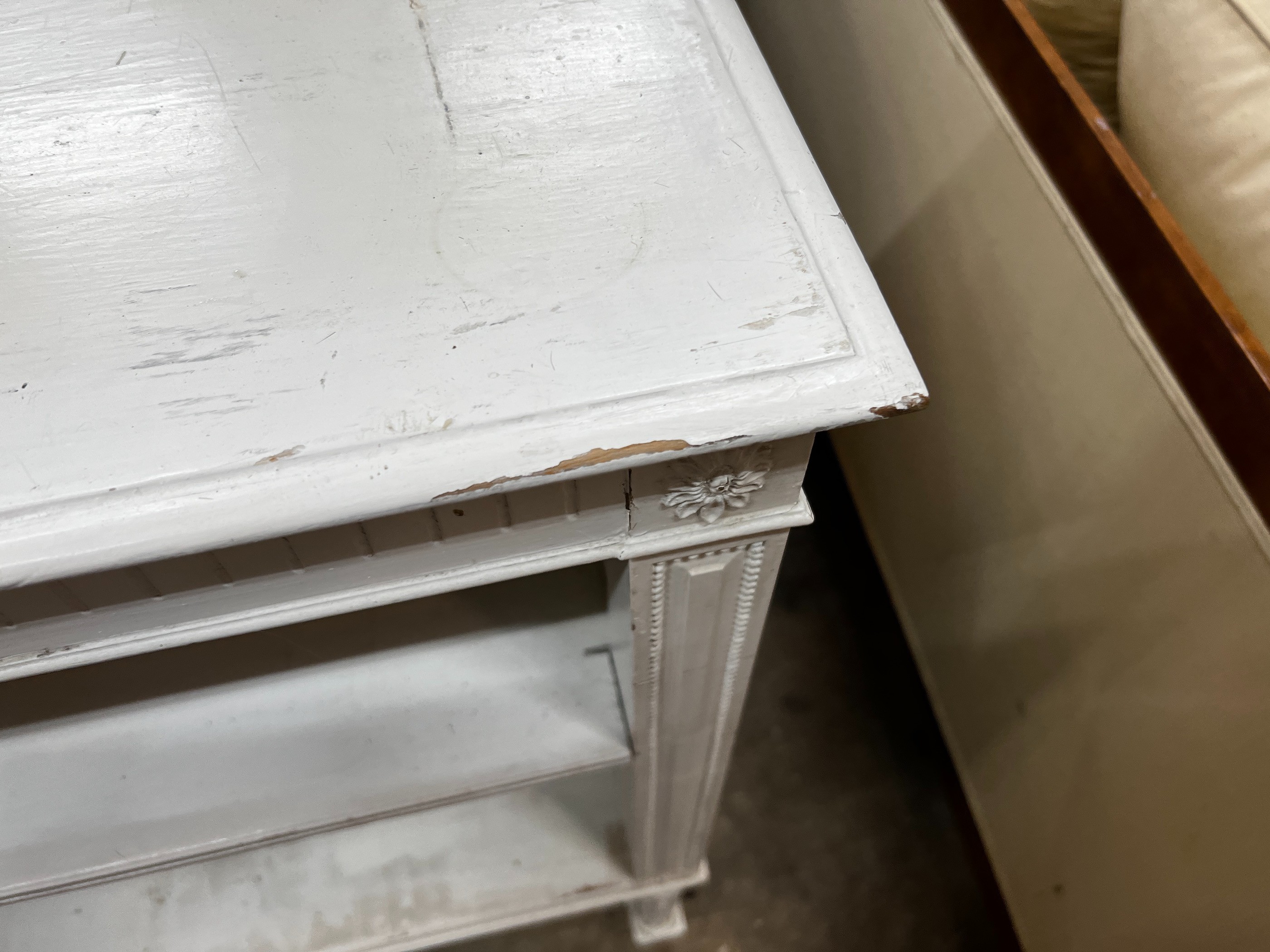 An early 20th century French painted open bookcase, length 110cm, depth 29cm, height 96cm